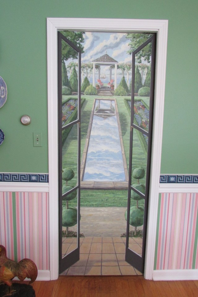 A pocket door in the Dining Room