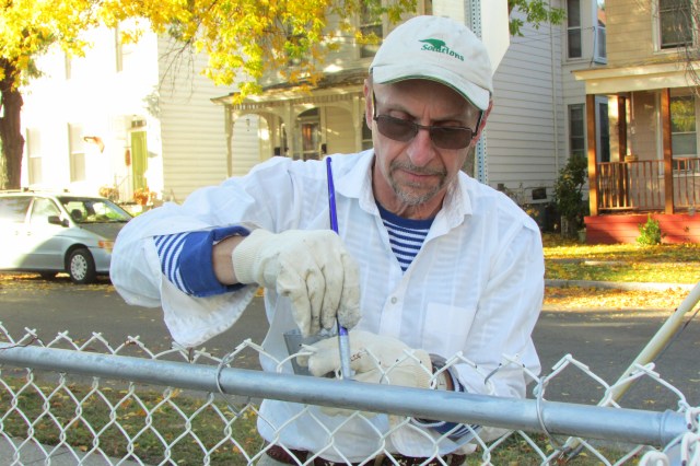 Here I am, painting the fence, at my Mother's house.