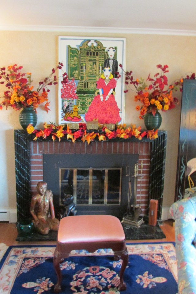 The fireplace decorated for Autumn.