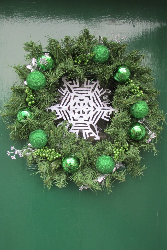 Christmas wreaths, that I've decorated, are hung on all the doors and windows.